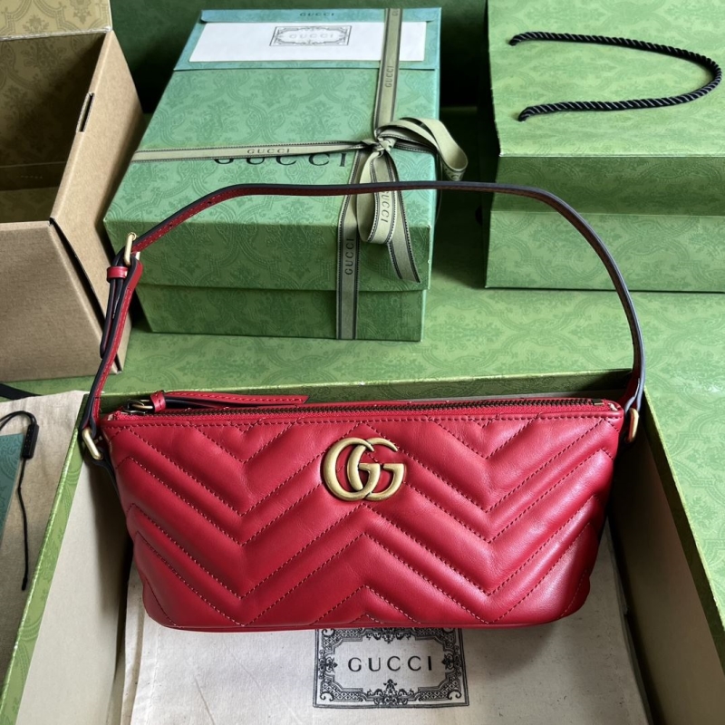 G*u*i top handle bags